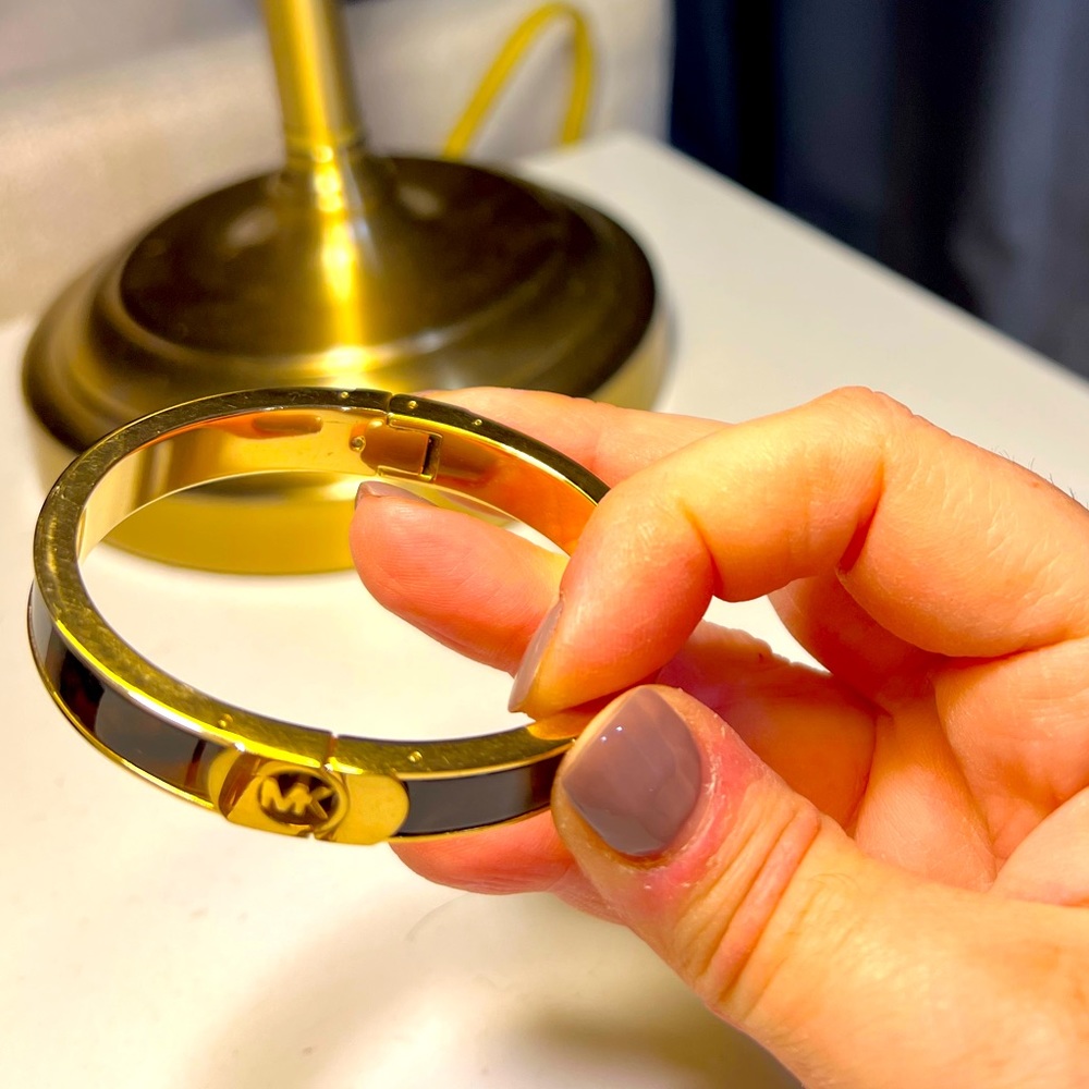 Micheal Kors tortoise and gold bracket